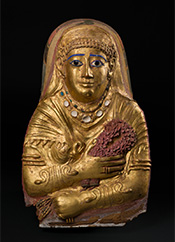 Gold mummy cartonnage of a woman on exhibition in Solid Gold at Brooklyn Museum, New York, November 16 - July 6, 2025, 112624